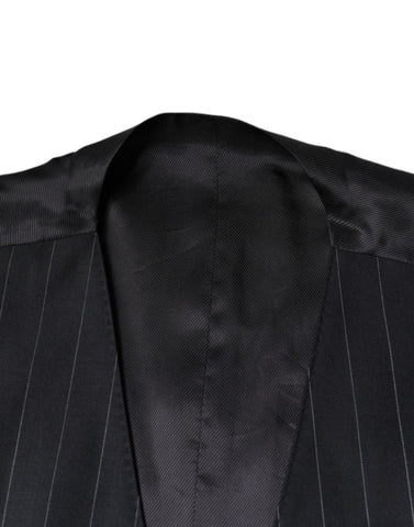 Black leather waistcoat dress by Dolce & Gabbana, featuring a sleek formal vest design with tailored fit and stylish details.