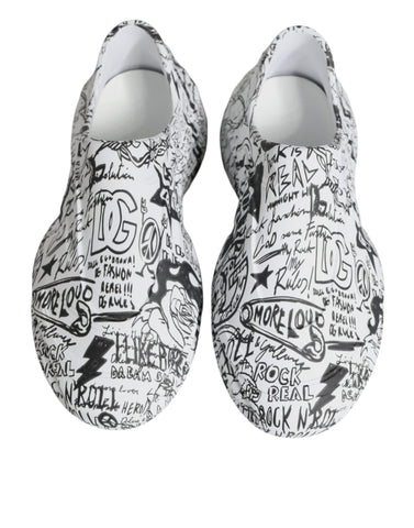 White and black graffiti-style Daymaster sneakers by Dolce & Gabbana with bold graphic design and comfortable sneaker silhouette.