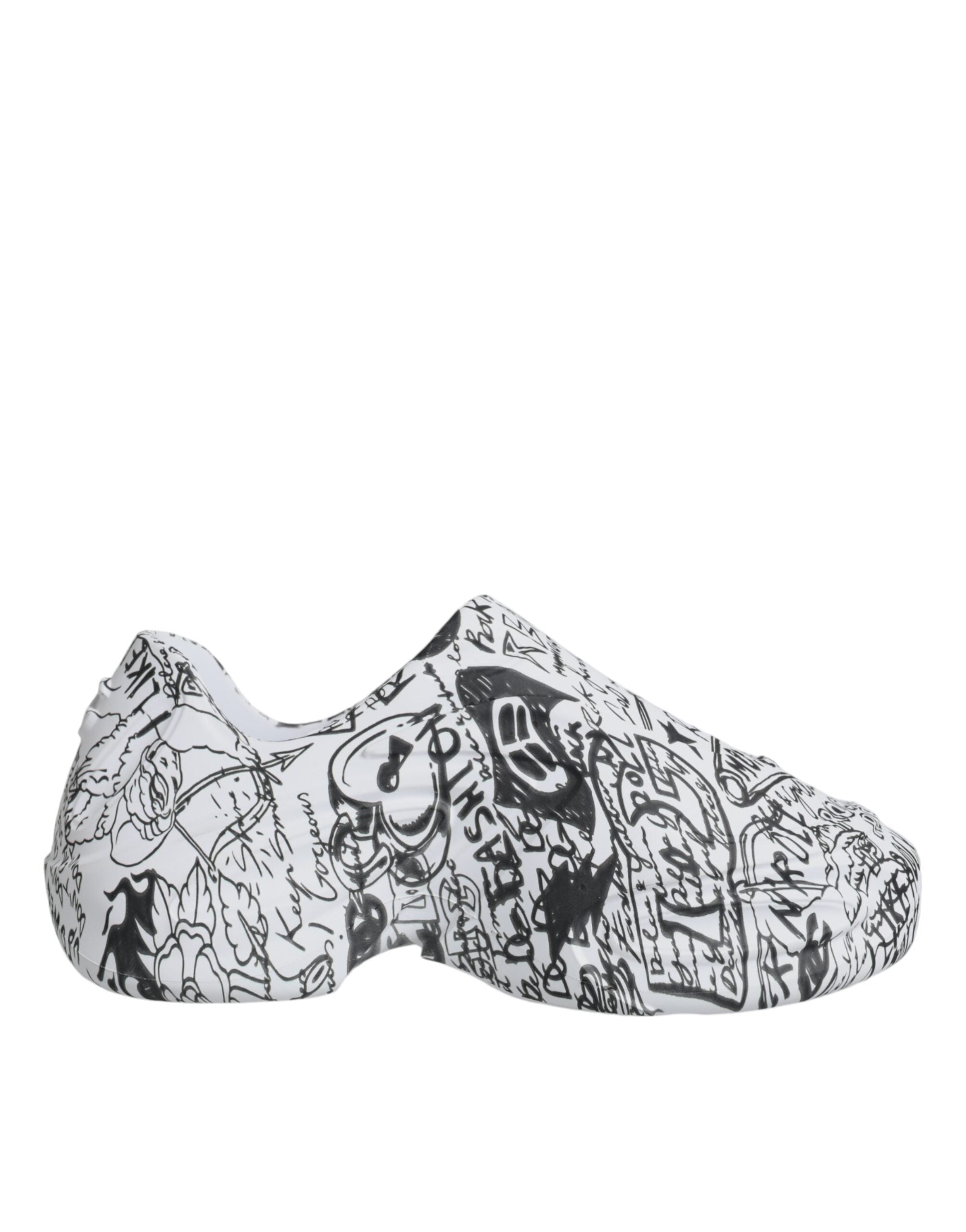 White and black graffiti-style Daymaster sneakers by Dolce & Gabbana featuring bold design and sporty laces.