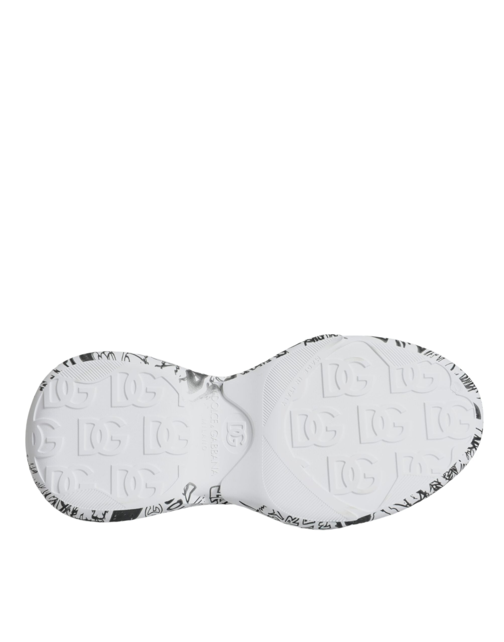 White and black graffiti-style Dolce & Gabbana Daymaster sneakers with bold design and sporty silhouette.