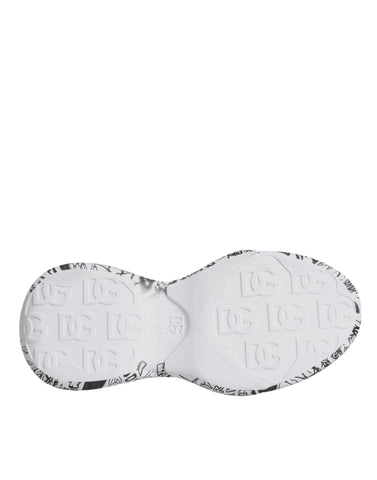 White and black graffiti-style Dolce & Gabbana Daymaster sneakers with bold design and sporty silhouette.