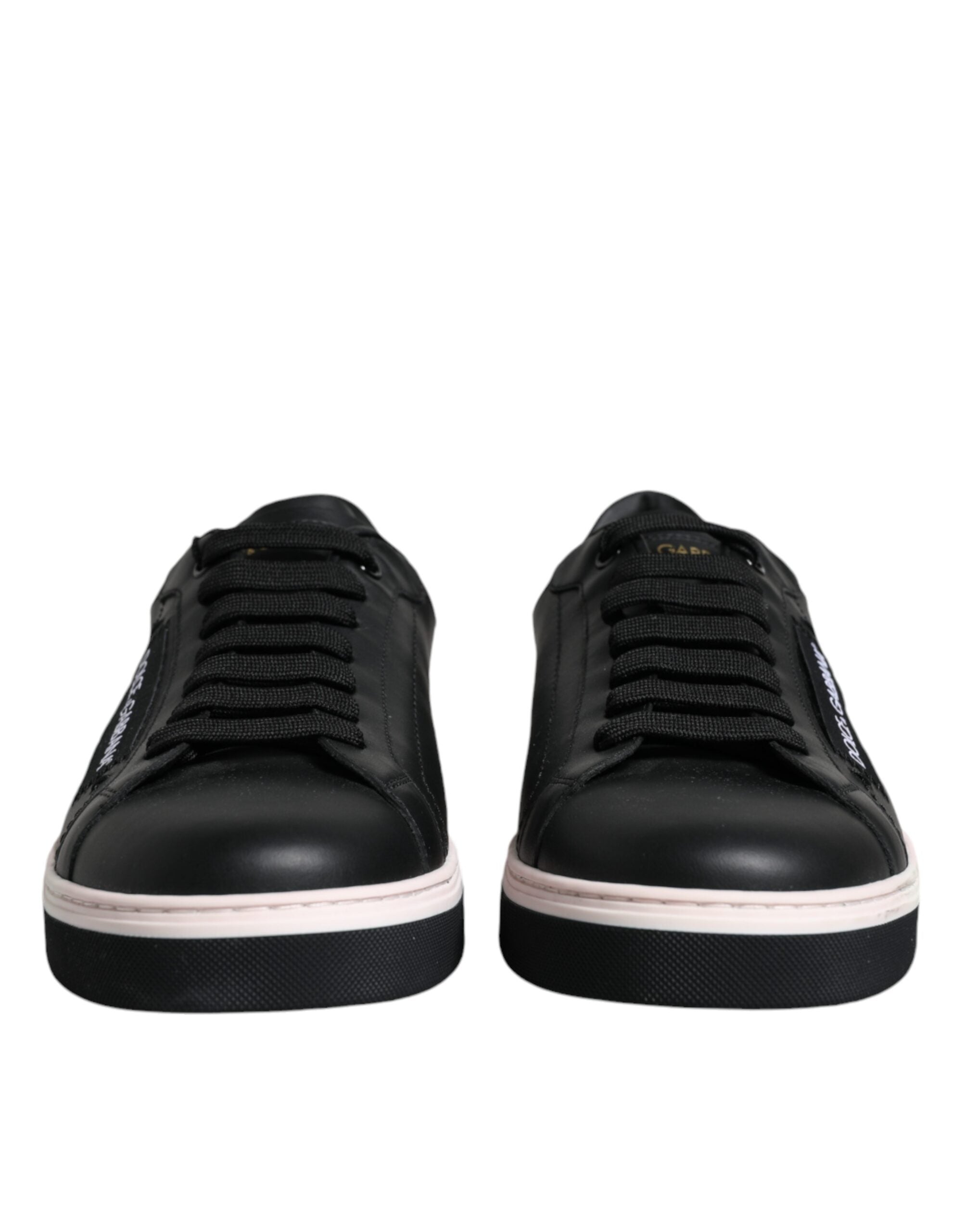 Black leather low-top men's sneakers by Dolce & Gabbana, featuring sleek design and classic lace-up style.