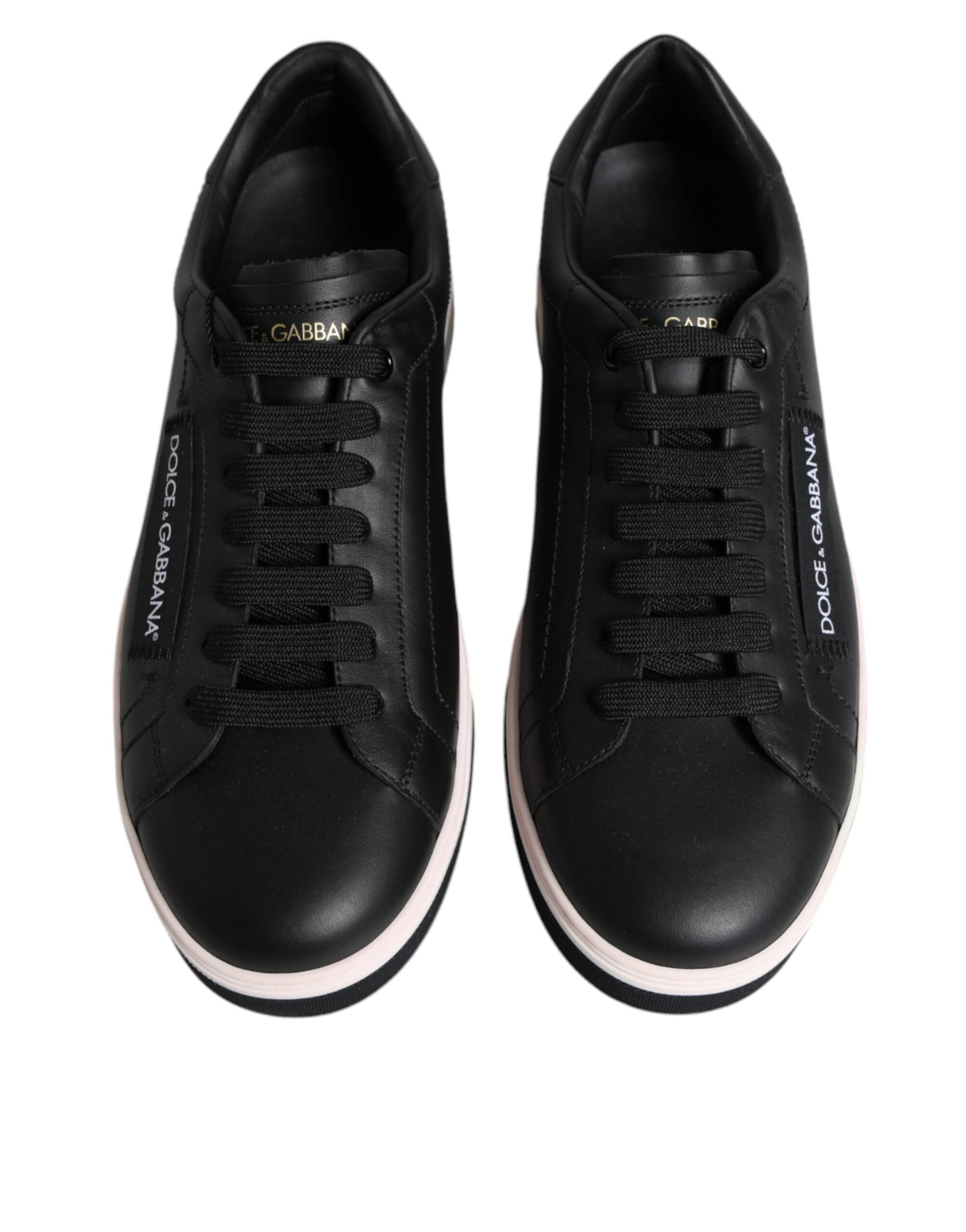 Black leather low-top men's sneakers by Dolce & Gabbana, featuring stylish design and white sole.