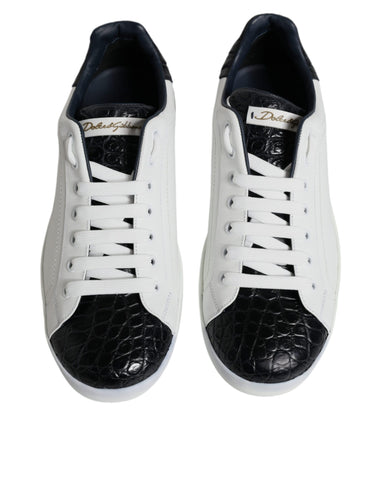 White leather Dolce & Gabbana Portofino sneakers with logo detail, featuring a sleek design and white rubber sole.