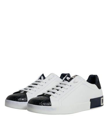 White leather Dolce & Gabbana Portofino sneakers with logo detail and stylish design, shown from a front angle.