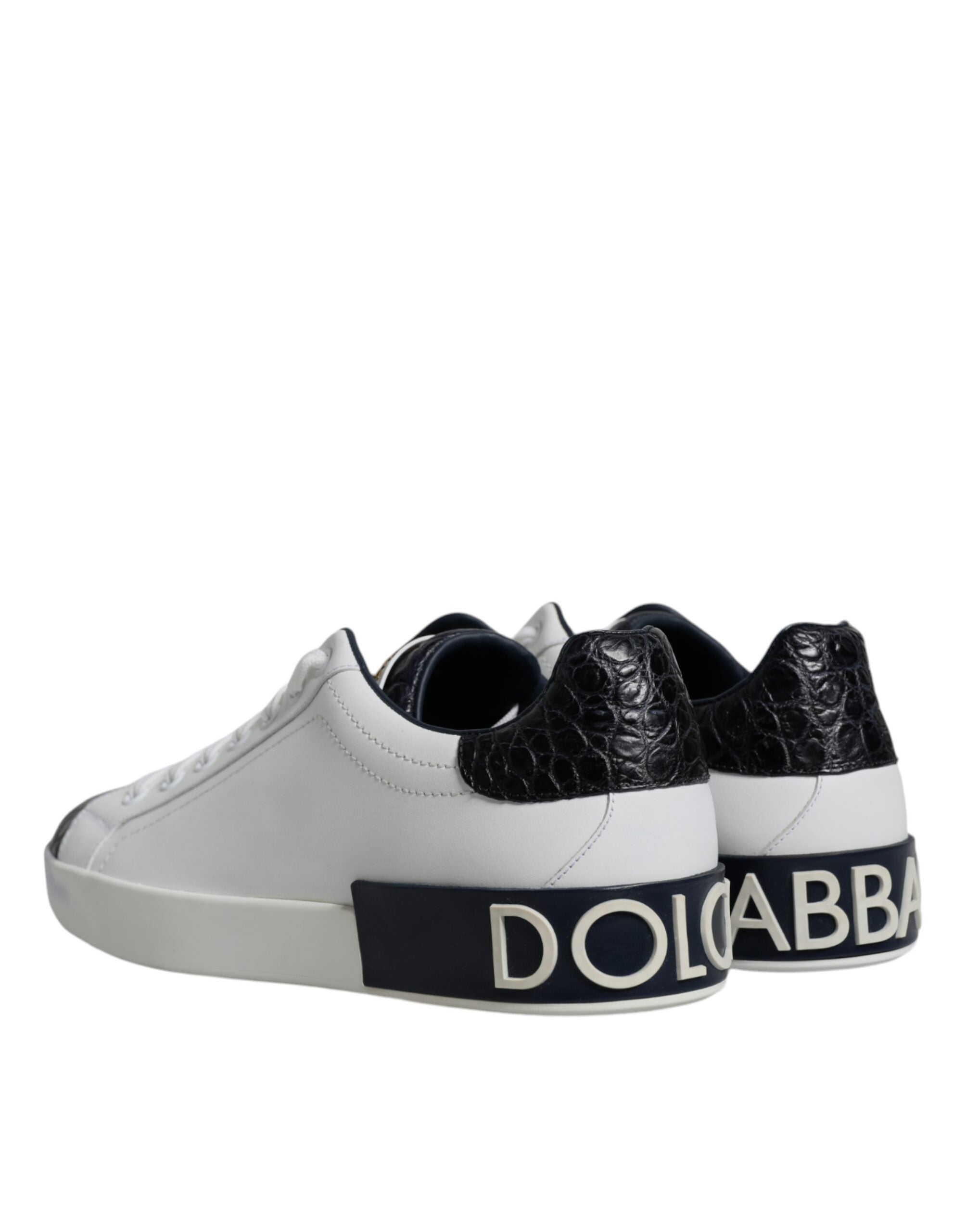 White leather Dolce & Gabbana Portofino sneakers with logo detail, showing the stylish casual shoe design.