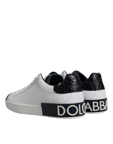 White leather Dolce & Gabbana Portofino sneakers with logo detail, showing the stylish casual shoe design.