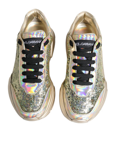 Dolce & Gabbana gold sequin iridescent Daymaster sneakers with shiny sequins and sporty design.