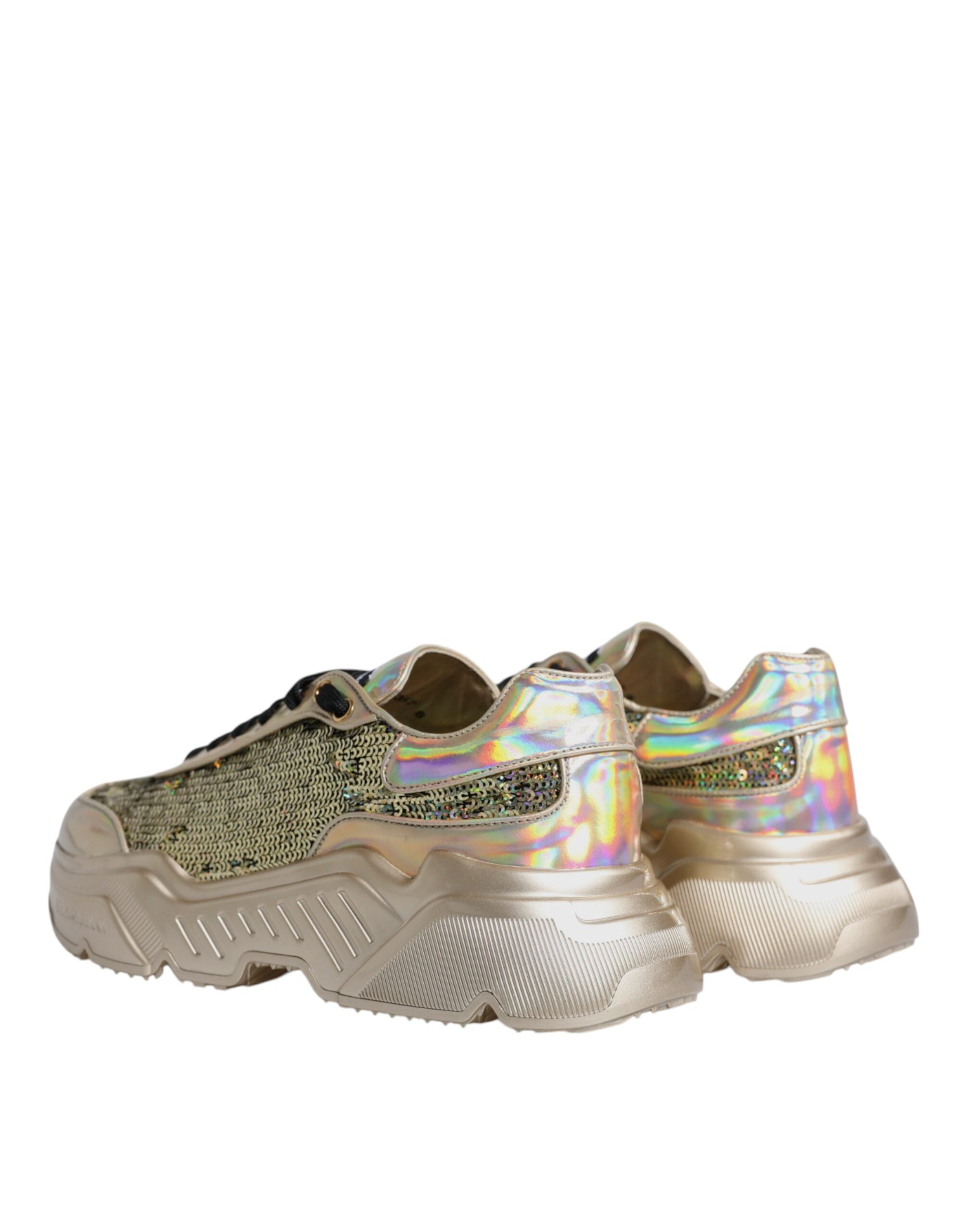 Gold sequin iridescent Daymaster sneakers by Dolce & Gabbana with shimmering sequins and sporty design on a white background.