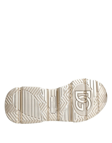 Gold sequin iridescent Daymaster sneakers by Dolce & Gabbana with sparkling sequin details and white rubber soles.