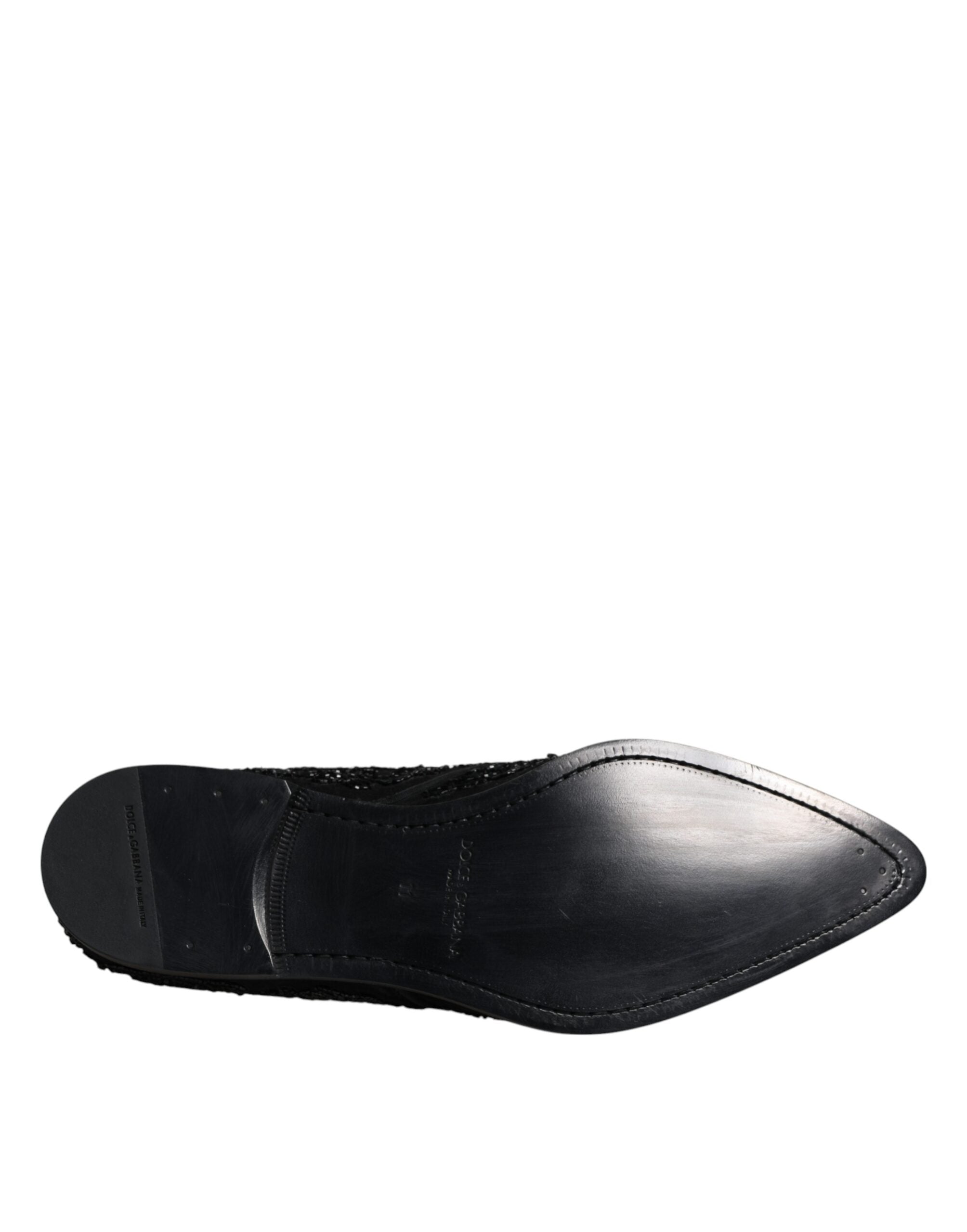 Black embellished suede derby shoes by Dolce & Gabbana with decorative details and classic lace-up design.
