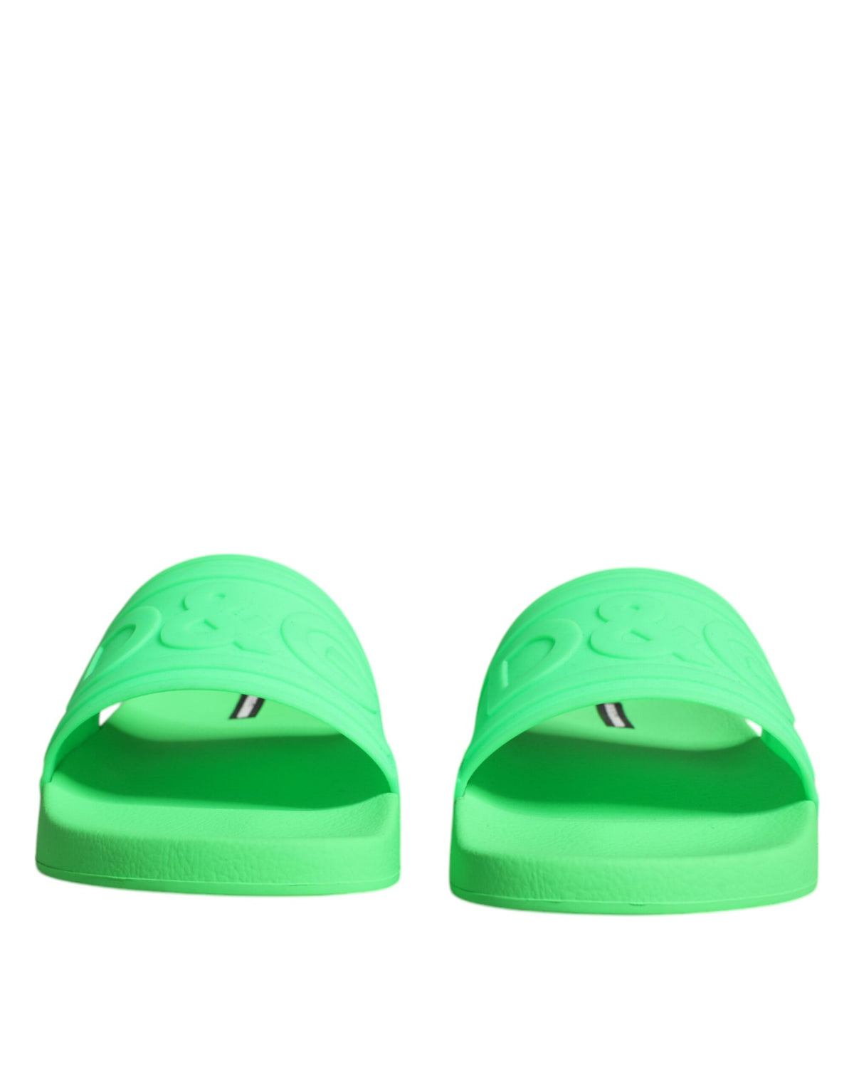 Green leather slides sandals by Dolce & Gabbana featuring a sleek design, perfect for beachwear and casual summer outings.