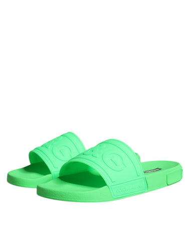 Green leather slides sandals by Dolce & Gabbana, stylish beachwear shoes with open-toe design and casual slip-on fit.