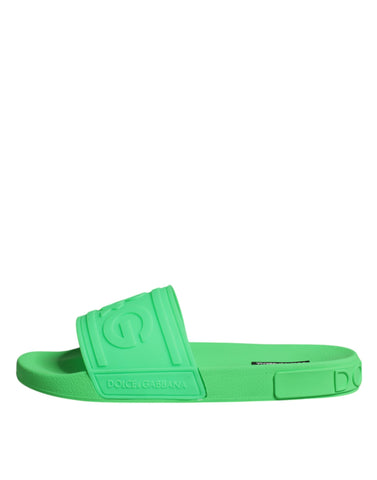 Green leather slides sandals by Dolce & Gabbana, stylish beachwear shoes with open-toe design and slip-on comfort.