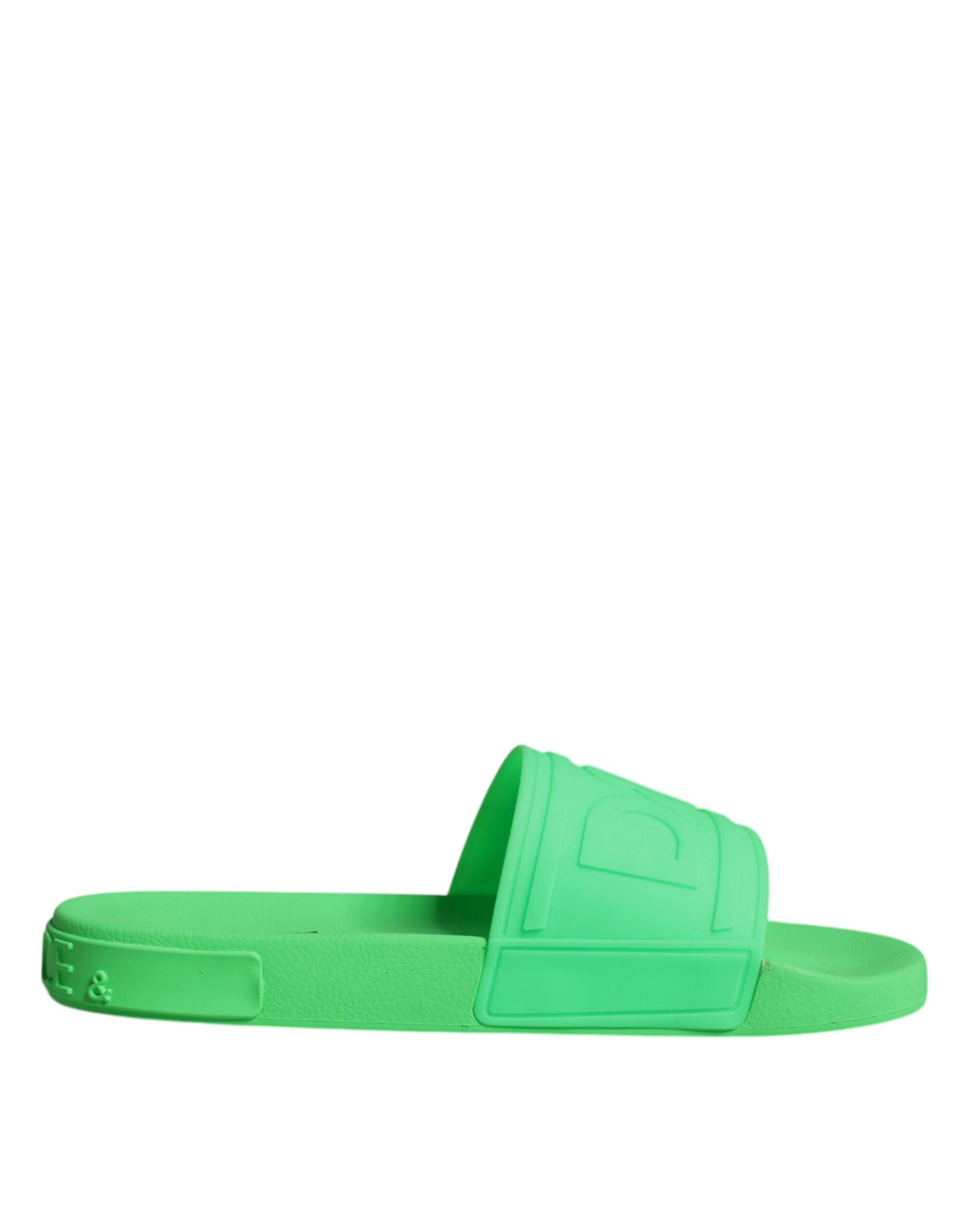 Green leather slides sandals by Dolce & Gabbana featuring open-toe design and casual beachwear style.