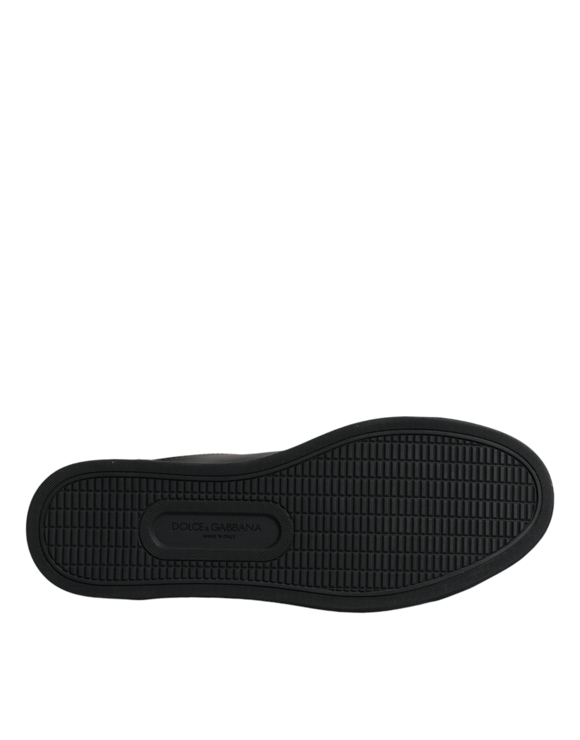 Black London Sacred Heart men's sneakers by Dolce & Gabbana with detailed Sacred Heart design and stylish casual shoe appearance.
