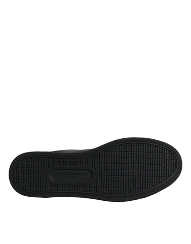 Black London Sacred Heart men's sneakers by Dolce & Gabbana with detailed Sacred Heart design and stylish casual shoe appearance.