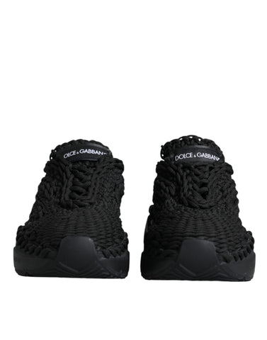 Black knitted Daymaster sneakers by Dolce & Gabbana, featuring a stylish casual design with textured knit material and sporty sole.