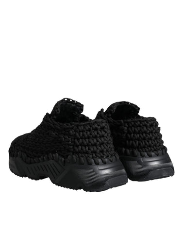 Black knitted Daymaster sneakers by Dolce & Gabbana with textured knit upper and casual athletic style.