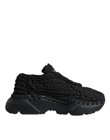Black knitted Daymaster sneakers by Dolce & Gabbana with lace-up design and stylish modern look.