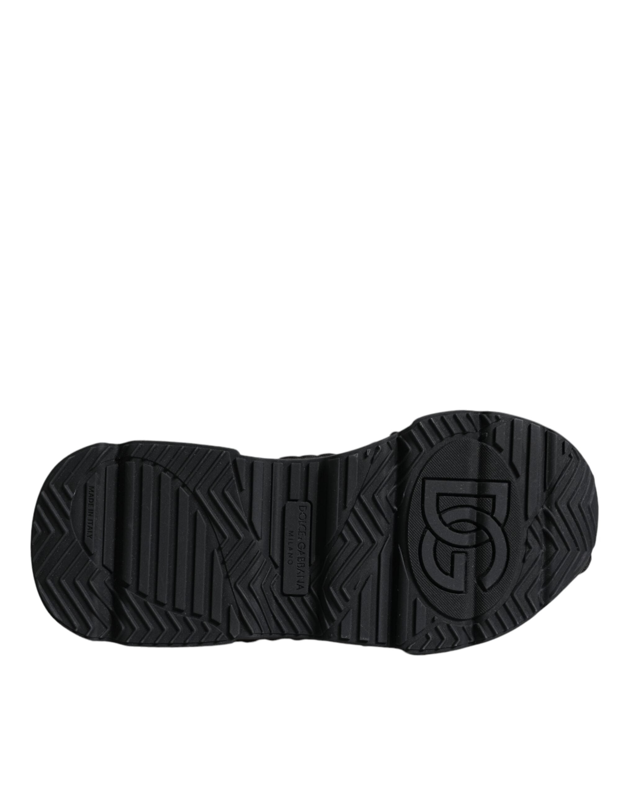 Black knitted Daymaster sneakers by Dolce & Gabbana, showing close-up of stylish knitted fabric and sleek sneaker design.