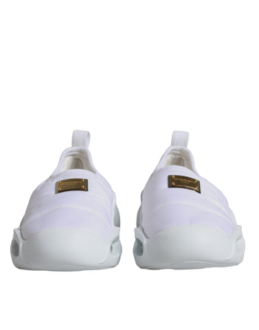 White padded fabric low top sneakers by Dolce & Gabbana with cushioned soles and stylish design.