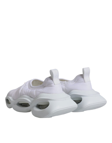 White padded fabric low top sneakers by Dolce & Gabbana with cushioned design and stylish casual look.