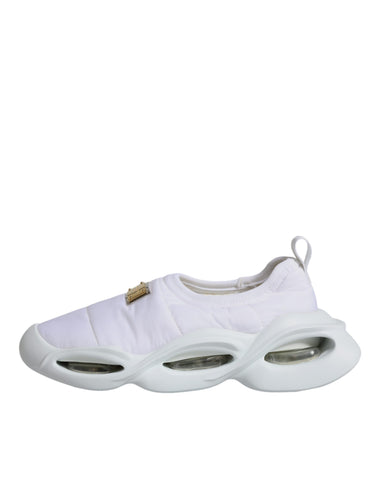 White padded fabric low top sneakers by Dolce & Gabbana with a sleek, minimalist design and comfortable fit.