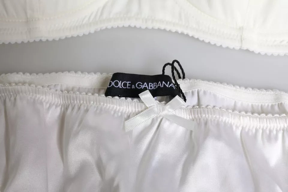 White silk stretch panty and balconette bra set by Dolce & Gabbana, featuring elegant, smooth fabric and delicate design.