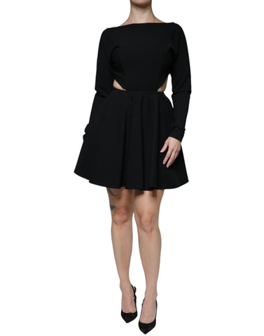 Black viscose cut-out A-line mini dress with long sleeves by Dolce & Gabbana, shown on a model.