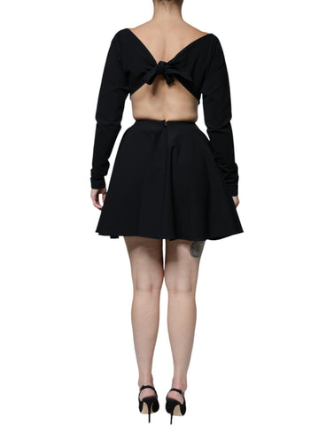 Black viscose Dolce & Gabbana A-line mini dress with cut-out details and long sleeves, stylish and elegant.