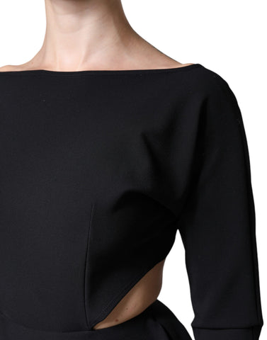 Black viscose cut-out A-line mini dress with long sleeves by Dolce & Gabbana, shown on a model.