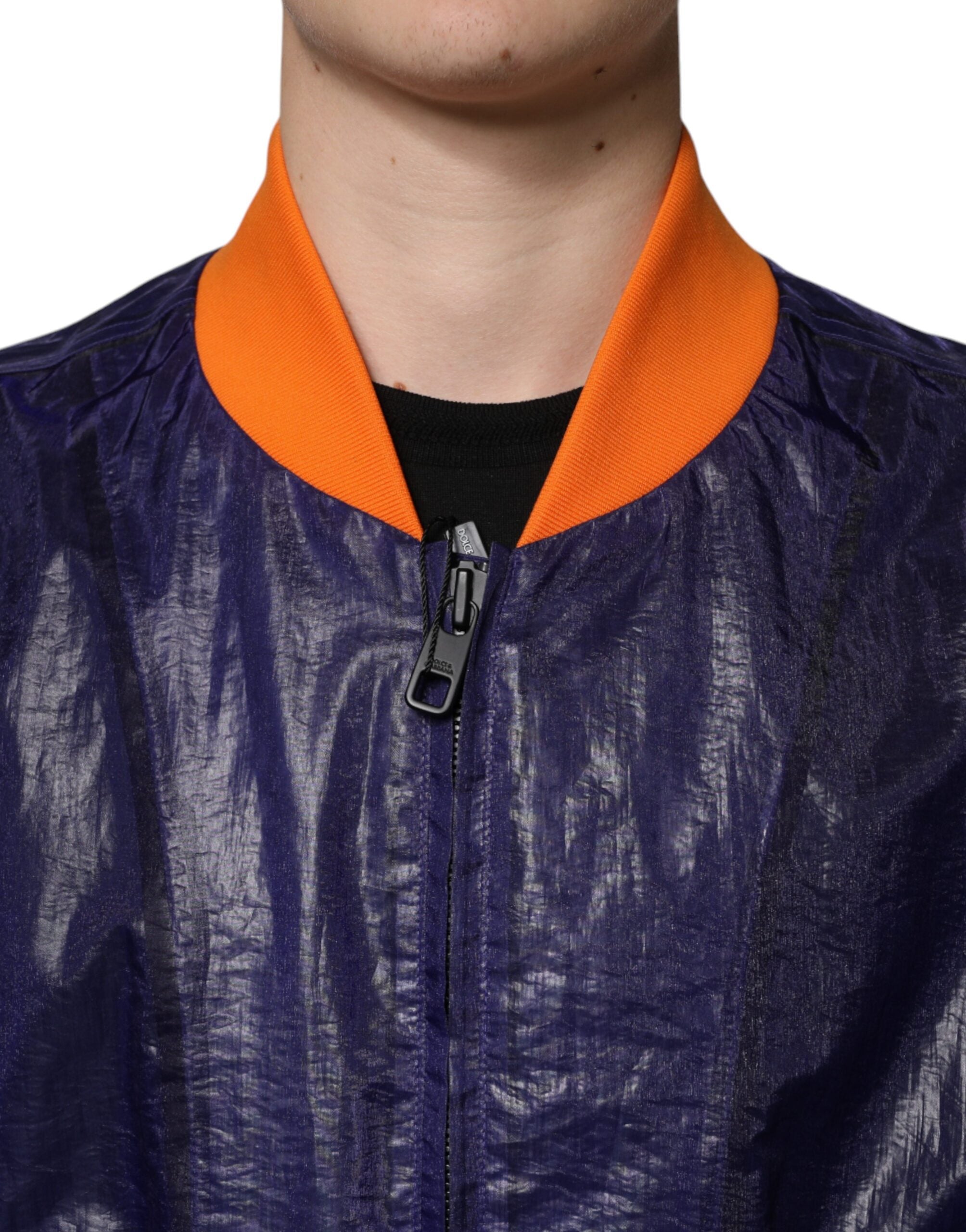 Blue cotton stretch full zip bomber jacket by Dolce & Gabbana with ribbed cuffs and collar, shown on a hanger.