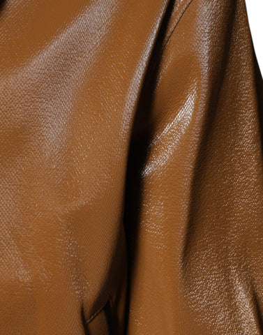 Brown leather full zip men's bomber jacket by Dolce & Gabbana hanging on a hanger with visible zipper and collar details.