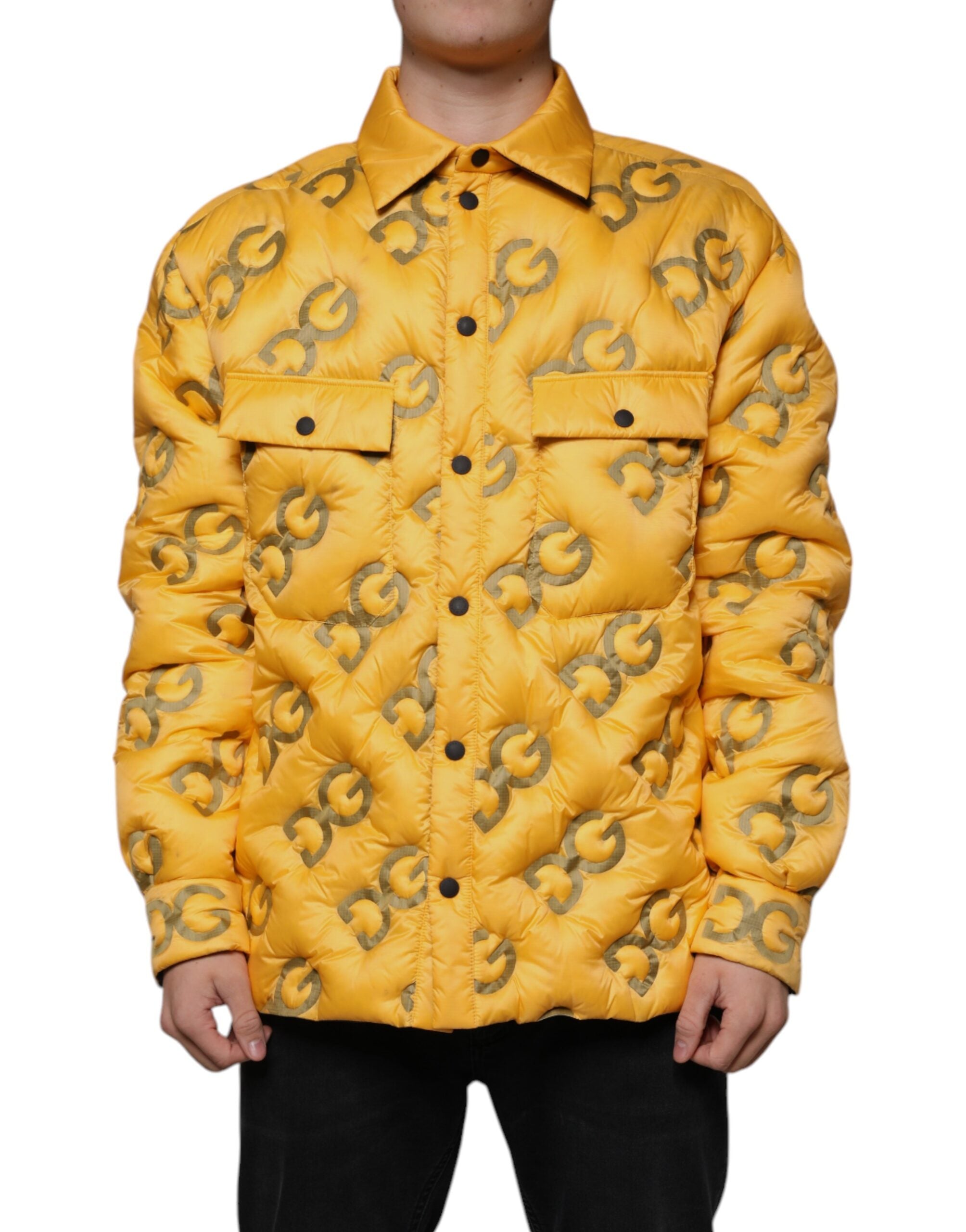 Yellow Dolce & Gabbana logo padded blouson jacket with buttoned front and quilted design, displayed on a hanger.