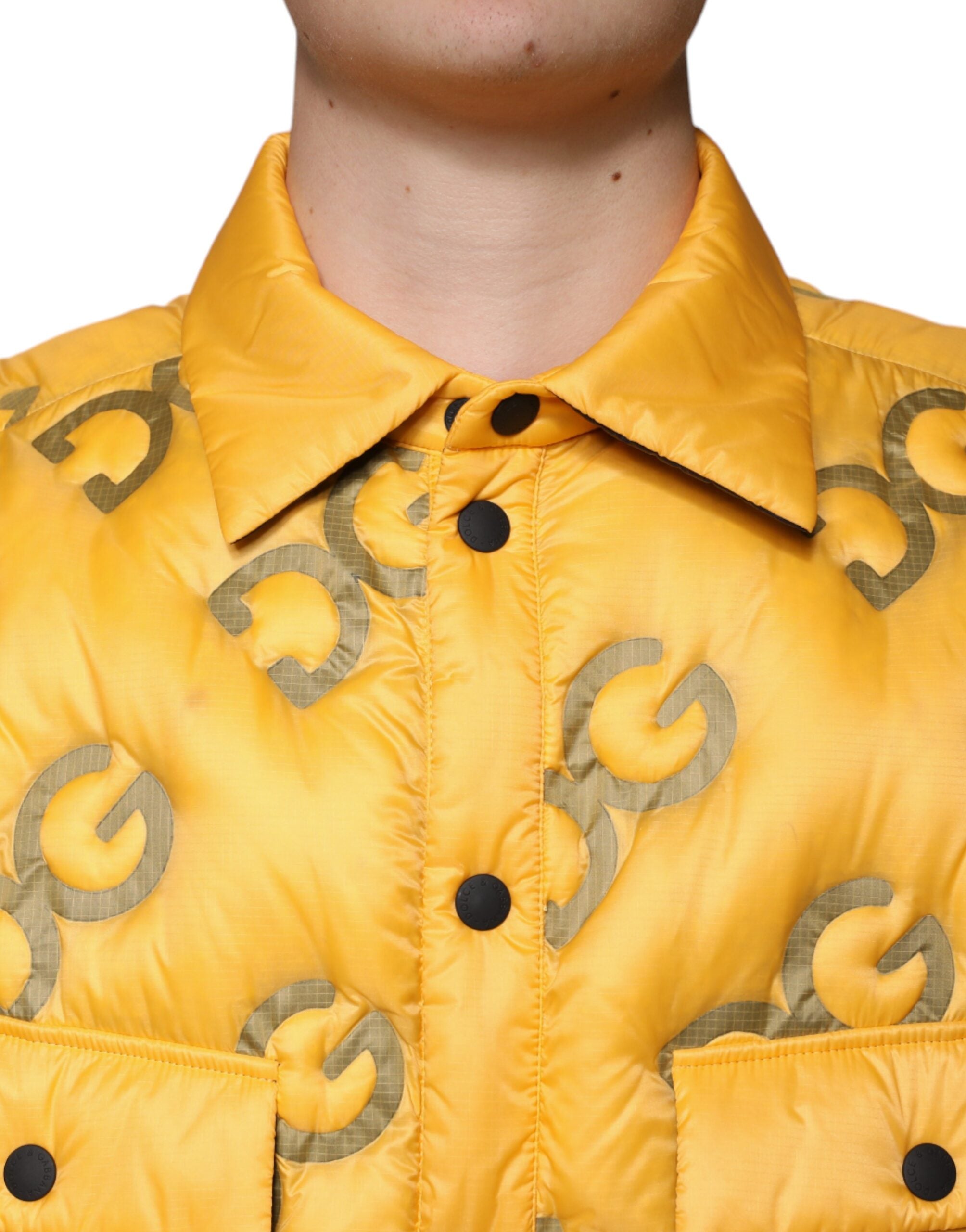 Yellow Dolce & Gabbana logo padded blouson jacket with button details, featuring a stylish, quilted design.