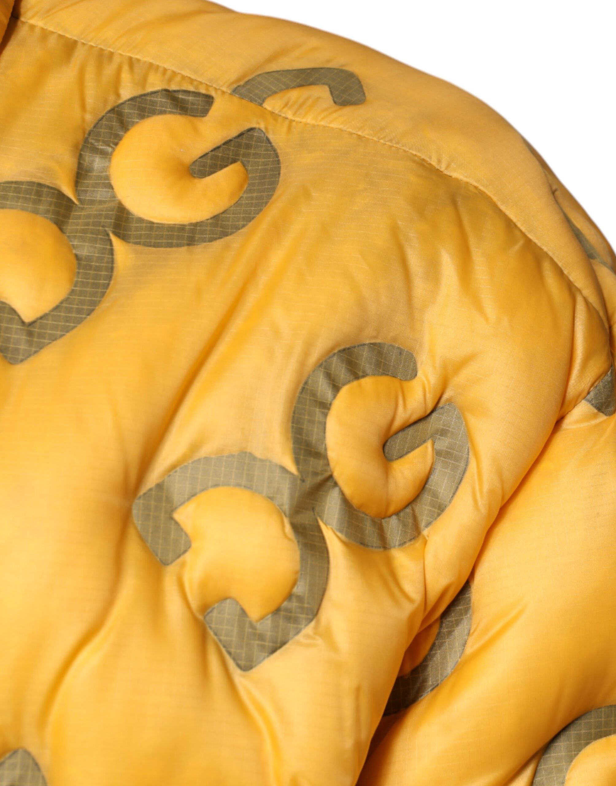 Dolce & Gabbana yellow logo padded buttoned blouson jacket with front pockets and ribbed cuffs, stylish and lightweight outerwear.