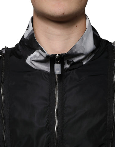 Black nylon full zip men's bomber jacket by Dolce & Gabbana, featuring a classic style with ribbed cuffs and collar.