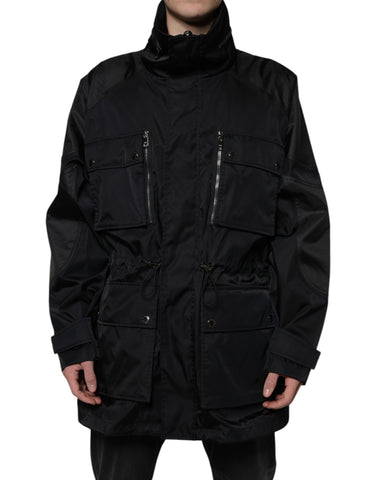 Black nylon winter men's parka coat by Dolce & Gabbana featuring a hood, front zipper, and quilted design.