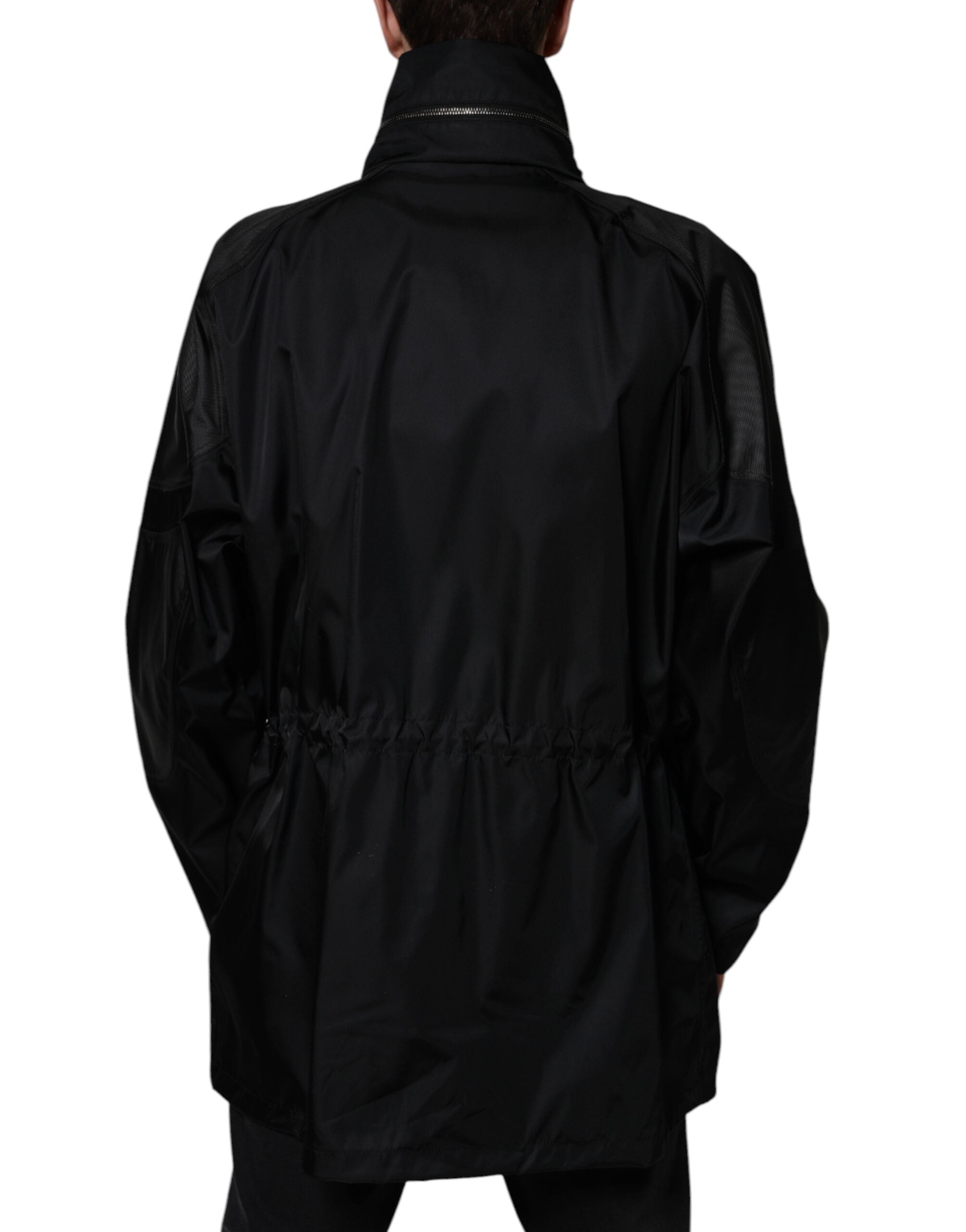 Black nylon winter men's parka coat by Dolce & Gabbana, shown with a hood, front zipper, and padded insulation for warmth.