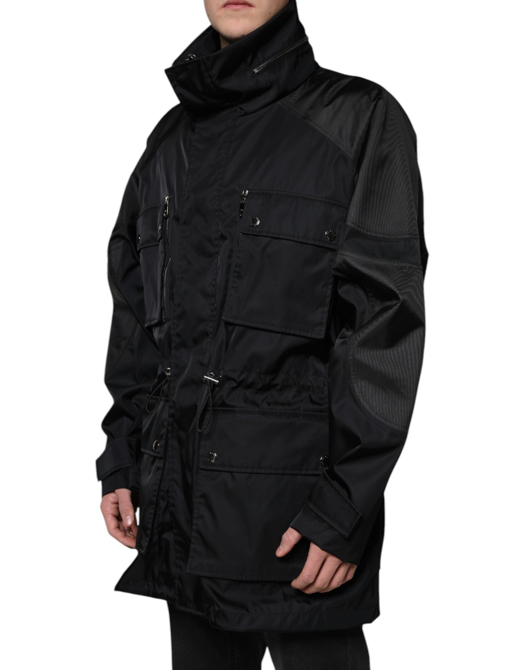 Black nylon winter men's parka coat by Dolce & Gabbana, featuring a hooded design and durable fabric for cold weather.