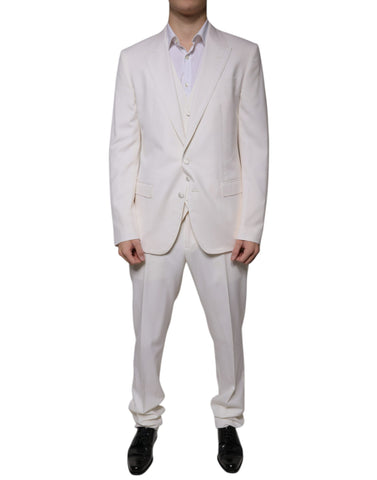 White wool silk 3-piece slim-fit formal suit by Dolce & Gabbana, featuring tailored jacket, vest, and trousers.