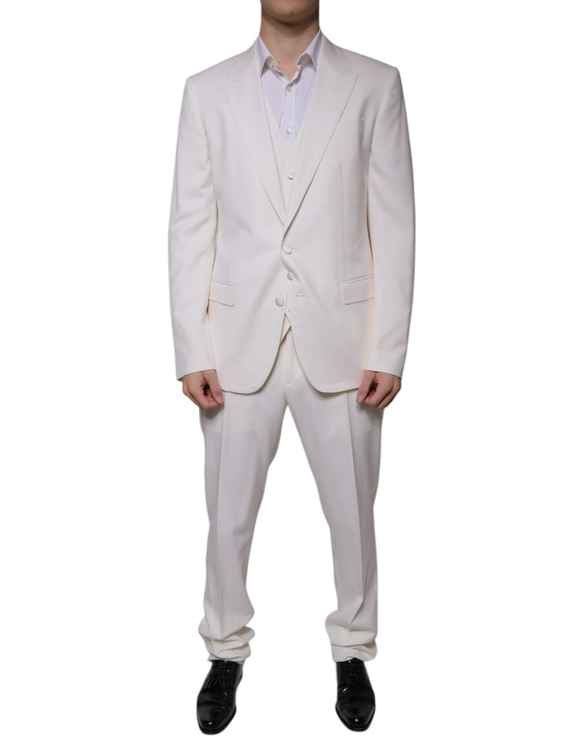 White wool silk 3-piece slim-fit formal suit by Dolce & Gabbana, featuring tailored jacket, trousers, and vest.