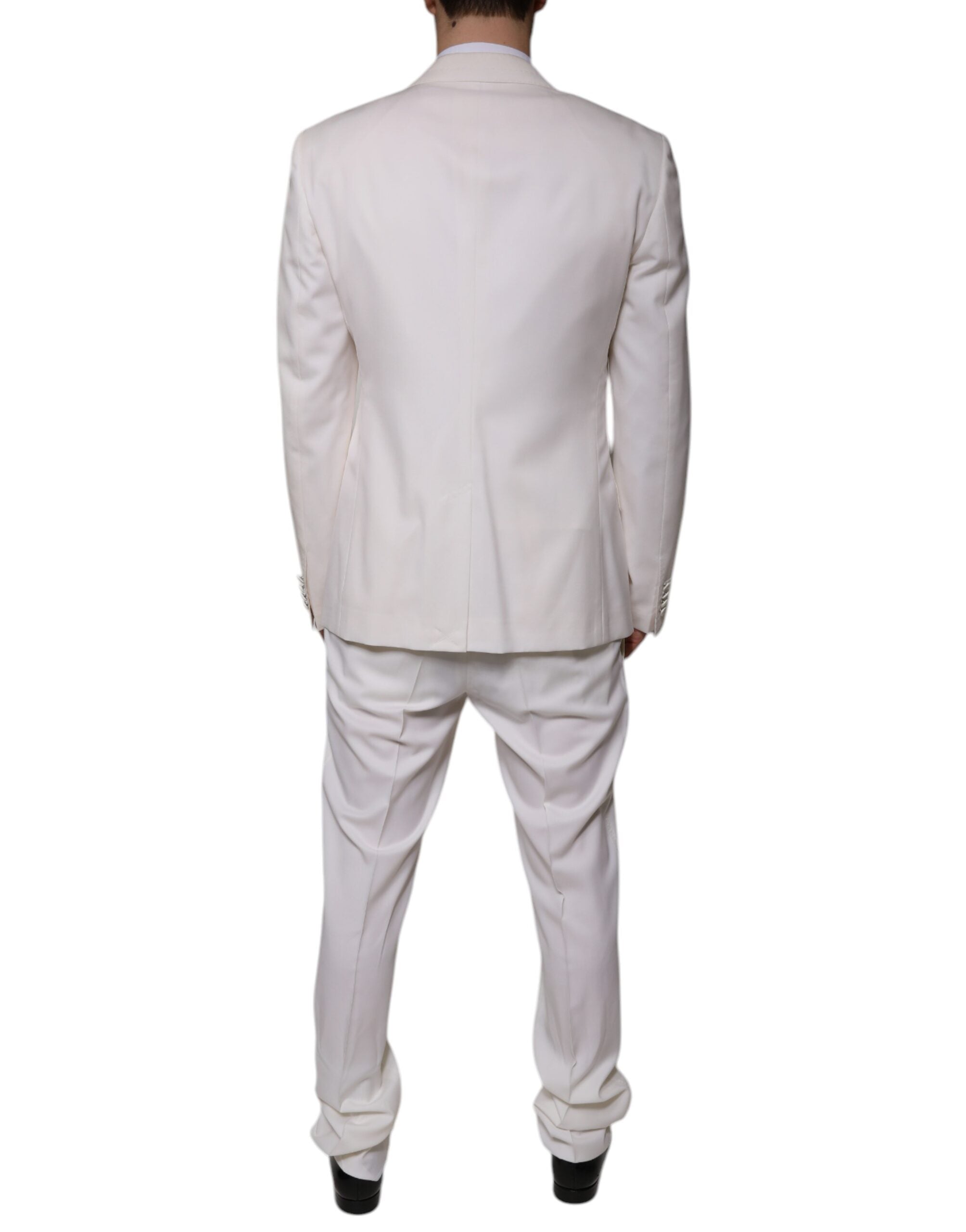 White wool silk 3-piece slim-fit formal suit by Dolce & Gabbana, featuring tailored jacket, vest, and matching trousers.
