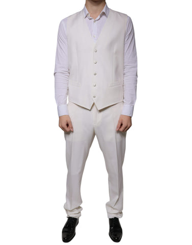 White wool silk 3-piece slim-fit formal suit by Dolce & Gabbana, featuring tailored jacket, vest, and matching trousers.