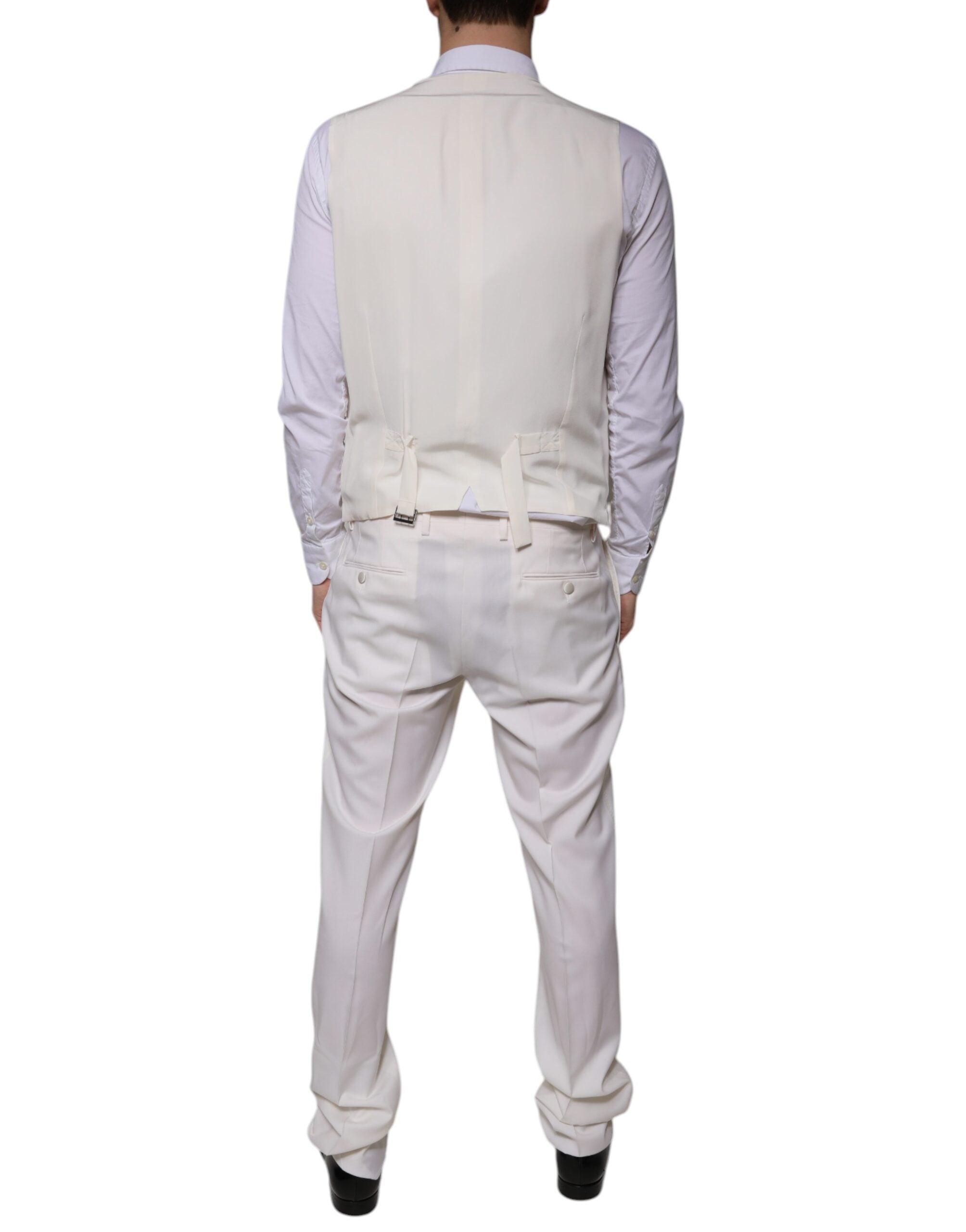 White wool silk slim-fit formal suit by Dolce & Gabbana, includes jacket, trousers, and vest, tailored for a sharp look.