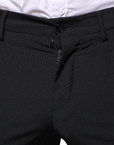 Black wool three-piece slim fit formal men's suit by Dolce & Gabbana, featuring a tailored jacket, vest, and trousers.