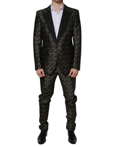 Black Stars Jacquard Sicilia 2-piece suit by Dolce & Gabbana, featuring a tailored jacket and matching trousers with star pattern.