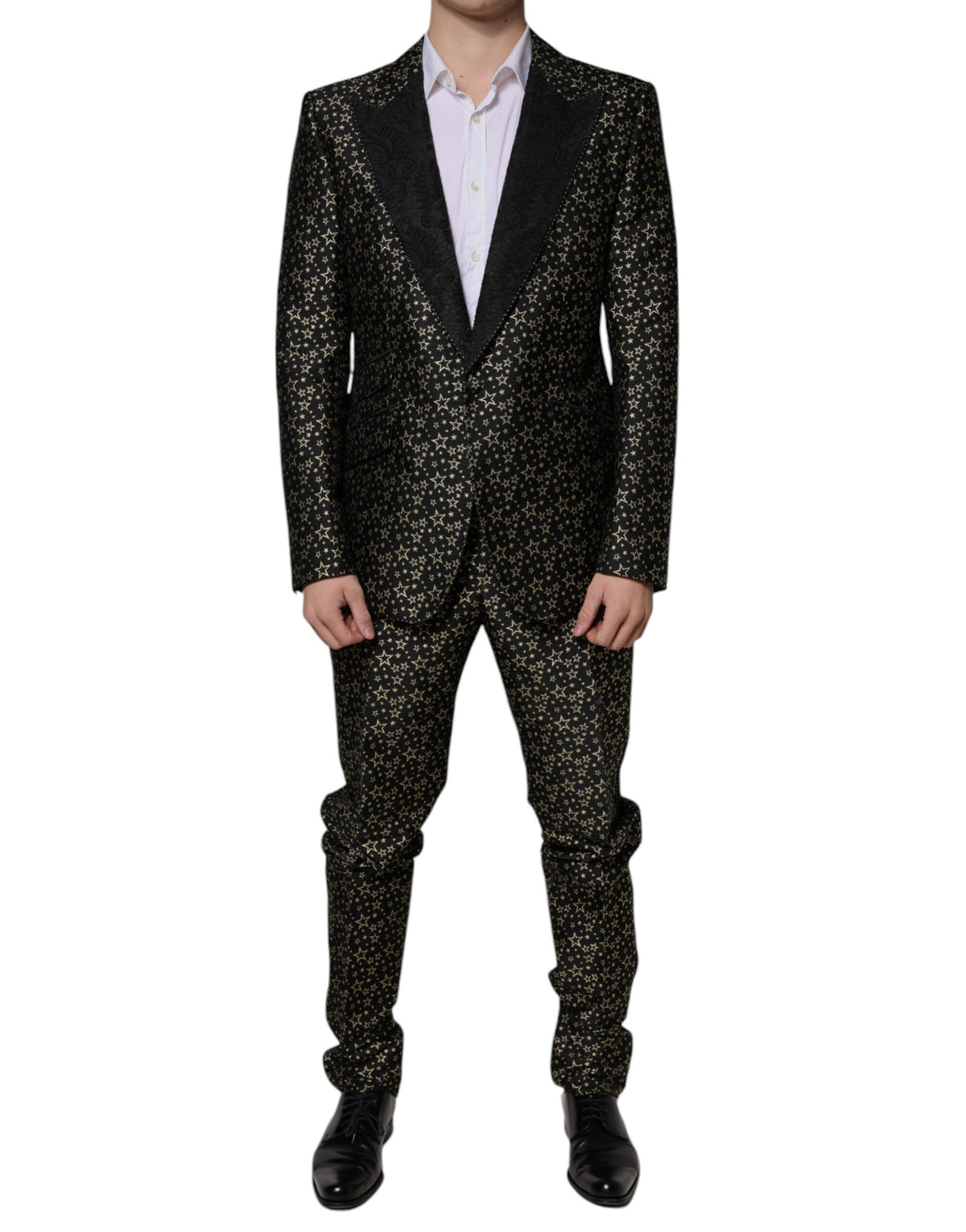 Black Stars Jacquard Sicilia 2-piece suit by Dolce & Gabbana, featuring a tailored blazer and matching trousers with star pattern.
