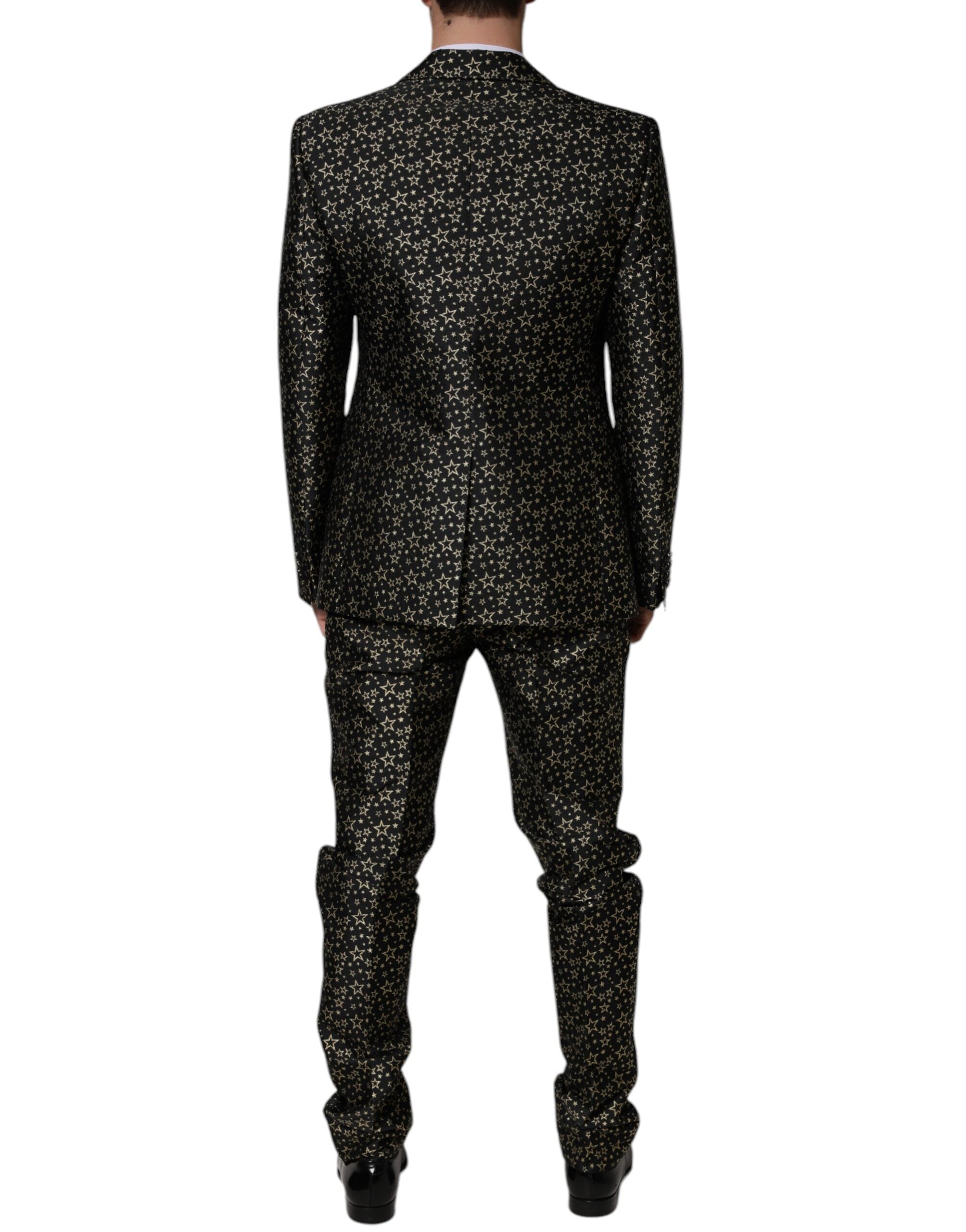 Black Stars Jacquard Sicilia 2-piece suit by Dolce & Gabbana, featuring a tailored jacket and matching trousers with star pattern.